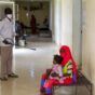 A man disinfects a rural isolation centre where patients are being treated for cholera in Kassala state, eastern Sudan. AFP