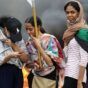 Sudanese women prepare to participate in demonstration