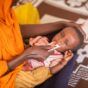 A child receives a life-saving therapeutic food treatment UNICEF photo)