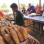 People gather to get bread while clashes rage between the Sudanese army and the paramilitary RSF in Khartoum North, on April 24, 2023. Reuters photo