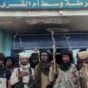 RSF fighters pose outside poliice station in Um Al Qura on December 7, 2024