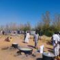 Volunteers prepare a meal for people displaced by conflict in East Al Jazirah at the Quoz Al Haj shelter in Shendi, on November 7, 2024