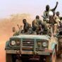 Sudanese army toops riding a vehicle in North Darfur (file photo)