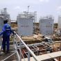 a_worker_walks_at_the_power_plant_of_an_oil_processing_facility_at_an_oilfield_in_unity_state_april_22_2012_reuters.jpg