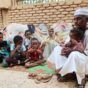 Mohamed Awad and his family rest after leaving Tuti Island, which is controlled by RSF, in Omdurman, Sudan, Nov 10, 2024. Reuters