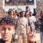 Sudanese arm and Keikl forces pose outside the Um al-Qura municipality on Jan 10, 2025