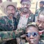 RSF commander Abu Aqla Kakil pose with the Sudanese army soldiers after his defection in Al-Jazirah state on October 20, 2024