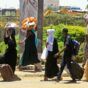 Civilian flee from southern Khartoum as fighting between the army and paramilitary forces led by rival generals rages on. (AFP-Getty Images)-