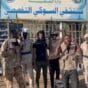 RSF fighters pose out of the Suki Hospital in Sennar State on Jul 25, 2024